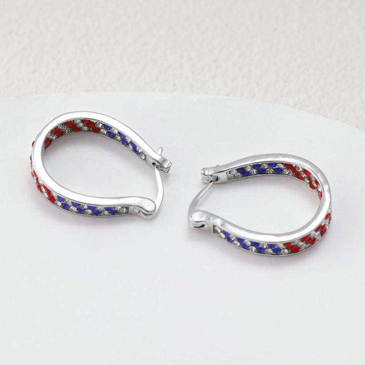 Ladies nano curved clip-on earrings with dense rhinestone embellishment and polished metal alloy Bowlift