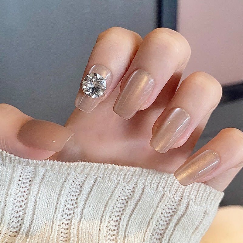 Glamorous Press-On Nail Set with Decorative Gemstone Accents Bowlift