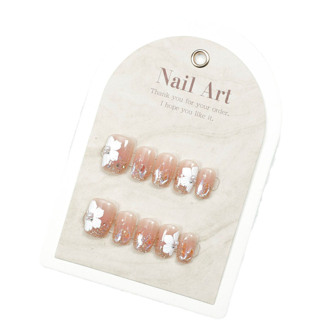 Artistic Floral-Embellished Press-On Nail Design Bowlift