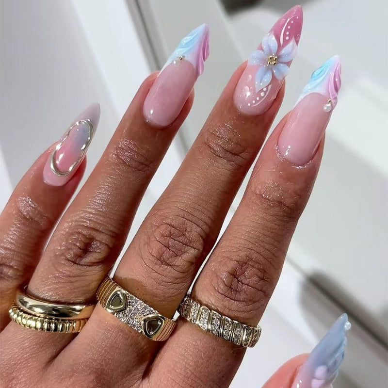 Artificial nails with flower pattern and glamorous accents Bowlift