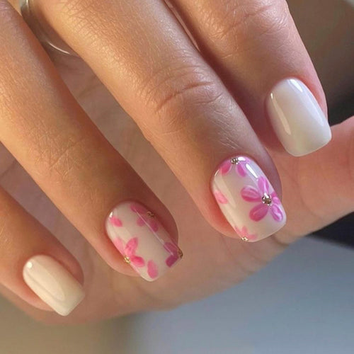 Stylish artificial nail design with floral accents Bowlift