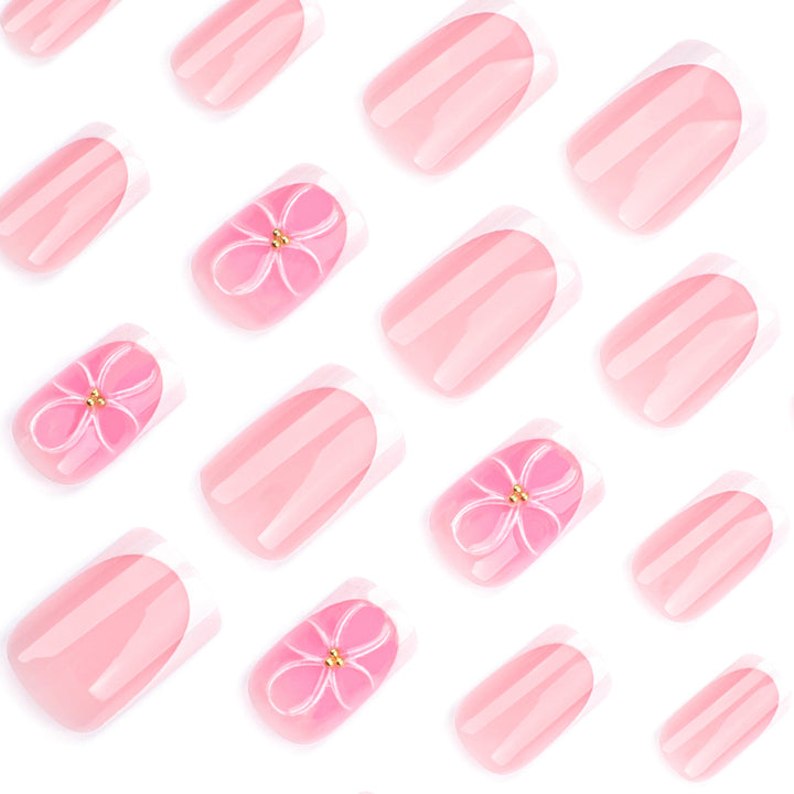 Artistic nail art with delicate flowers and elegant French lace Bowlift