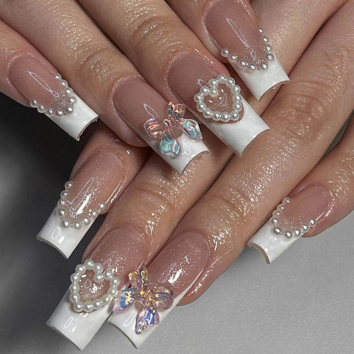 Acrylic nail set with elegant pearl and 3D flower decorations Bowlift