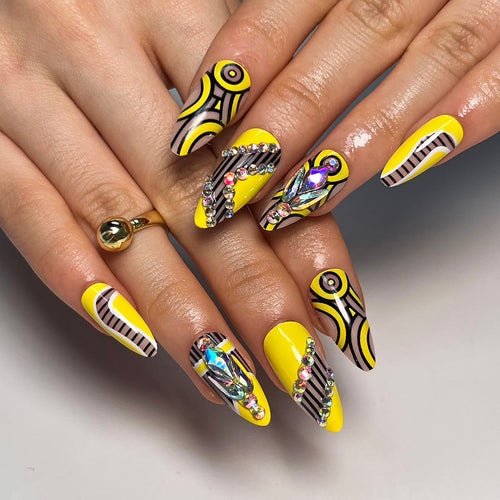 Artful nail extensions with geometric design and glitter accents Bowlift