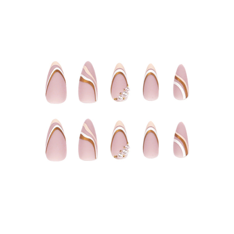Artful stiletto nails with elegant gold and white accents Bowlift