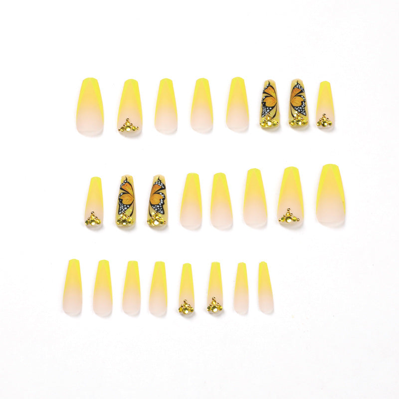 Artful Gel Nails with Butterfly Design and Glitter Bowlift