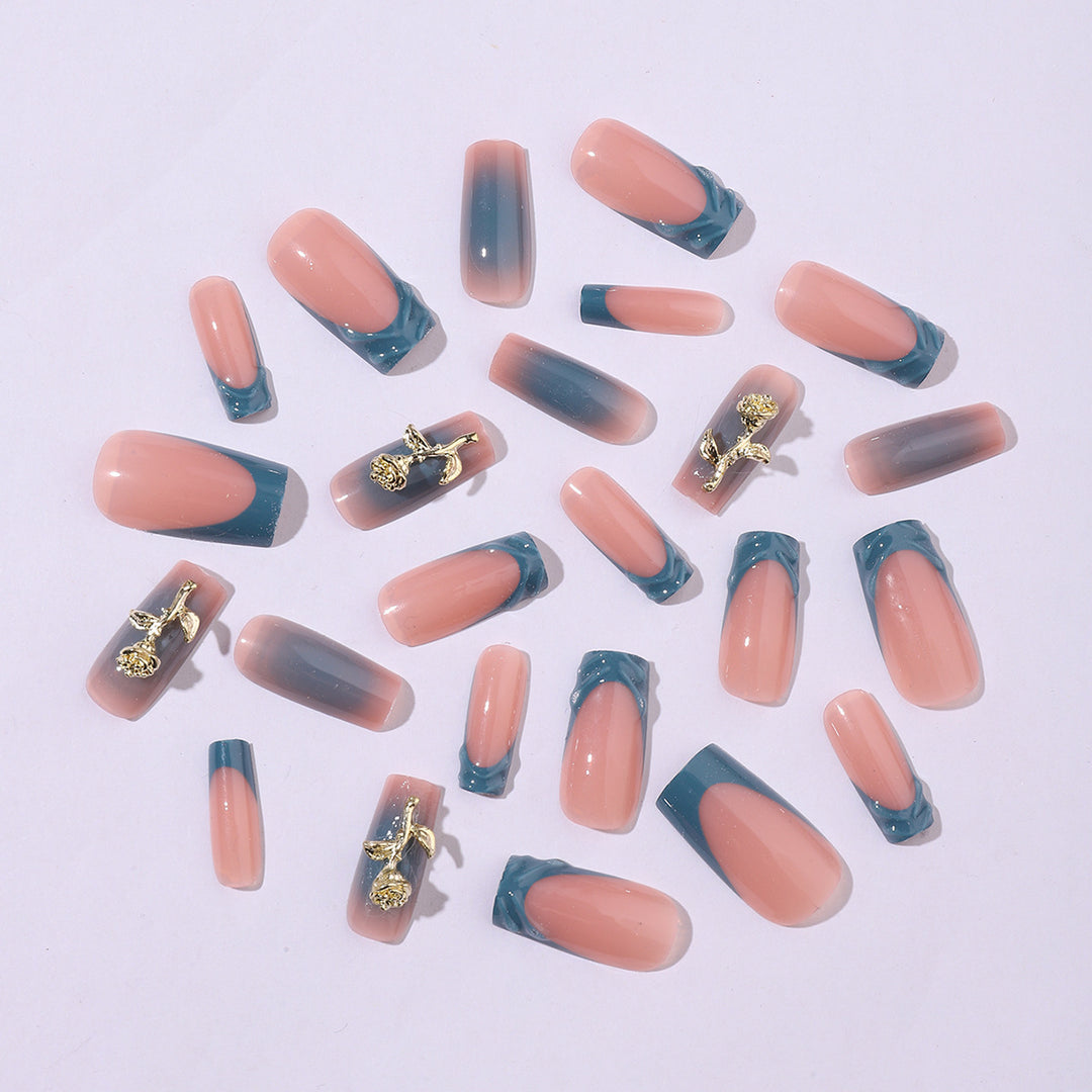 Elegant artificial nail creations with golden embellishments Bowlift