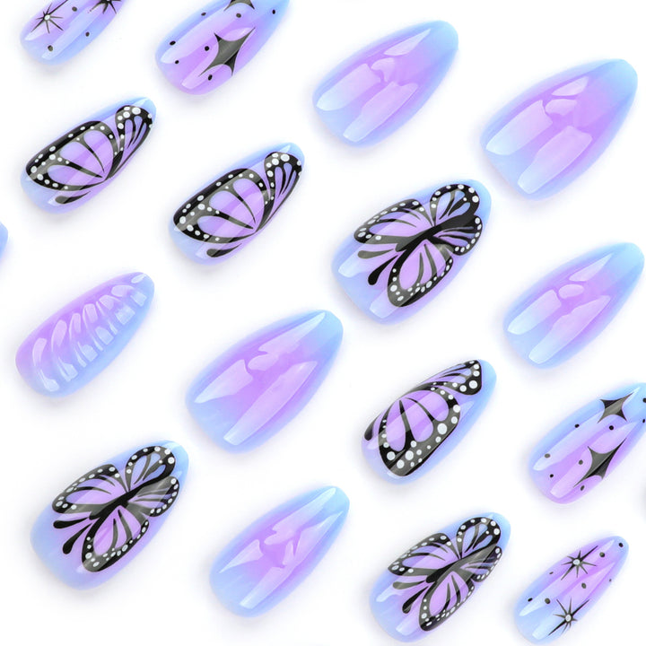 Artful stiletto nails with elegant butterfly design Bowlift