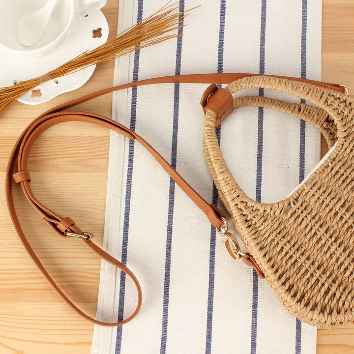 Shoulder bag made of woven natural material with elegant leather accent Bowlift