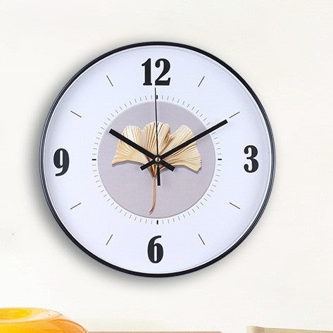 Wall clock with elegant leaf pattern Bowlift