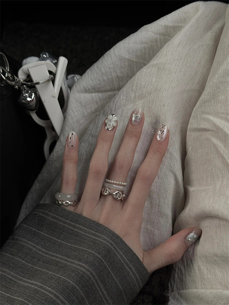Artificial nails with decorative accents Bowlift
