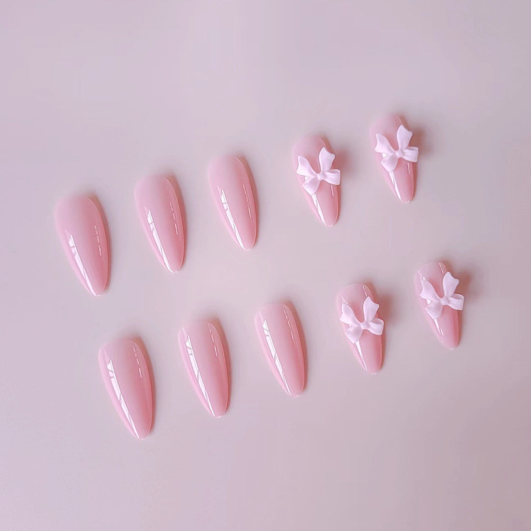 Artificial nails with elegant bow accents Bowlift