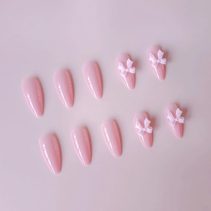 Artificial nails with elegant bow accents Bowlift