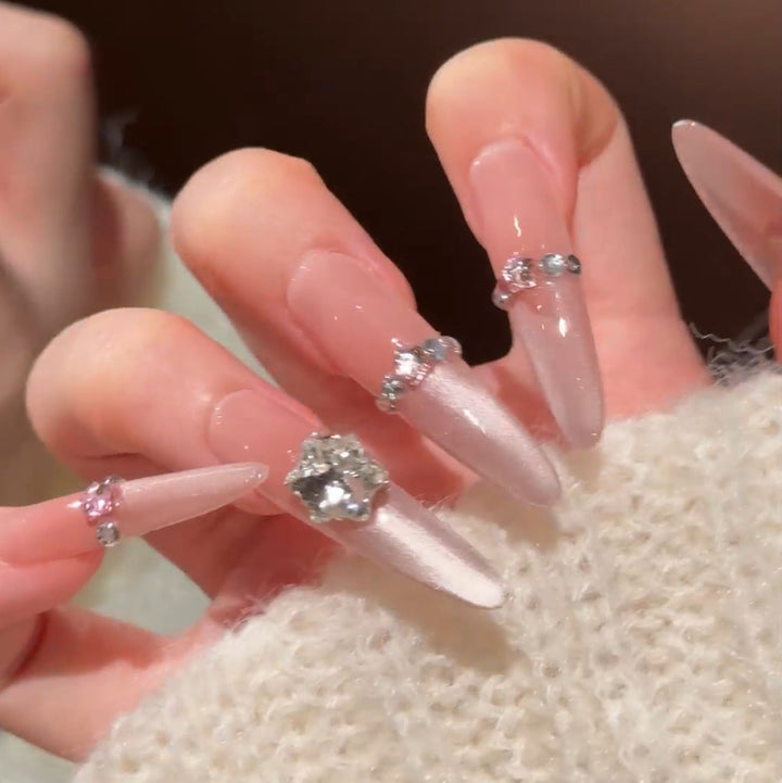 Artistic Stiletto Press-On Nail Art with Glimmering Accents Bowlift