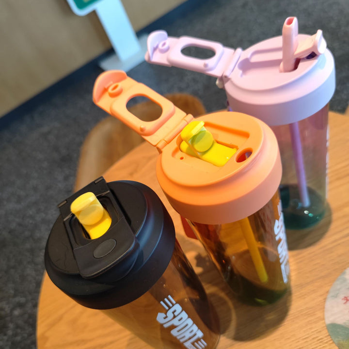 Women's sports water bottle with practical straw and carry function Bowlift
