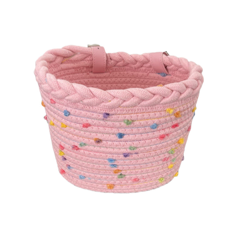 braided rope bike basket with pom pom embellishments and leather handlebar straps Bowlift