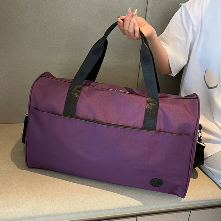 Sporty travel bag with sturdy carrying handles and removable shoulder strap Bowlift
