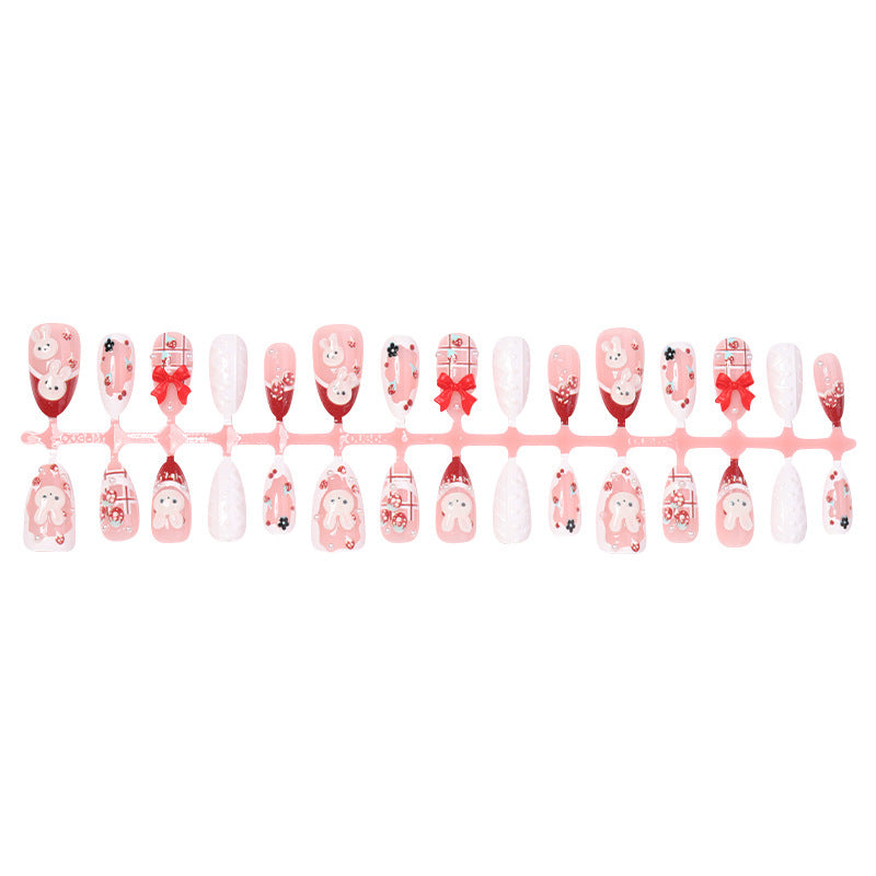 Creative acrylic nail set with playful bunny and gift designs Bowlift