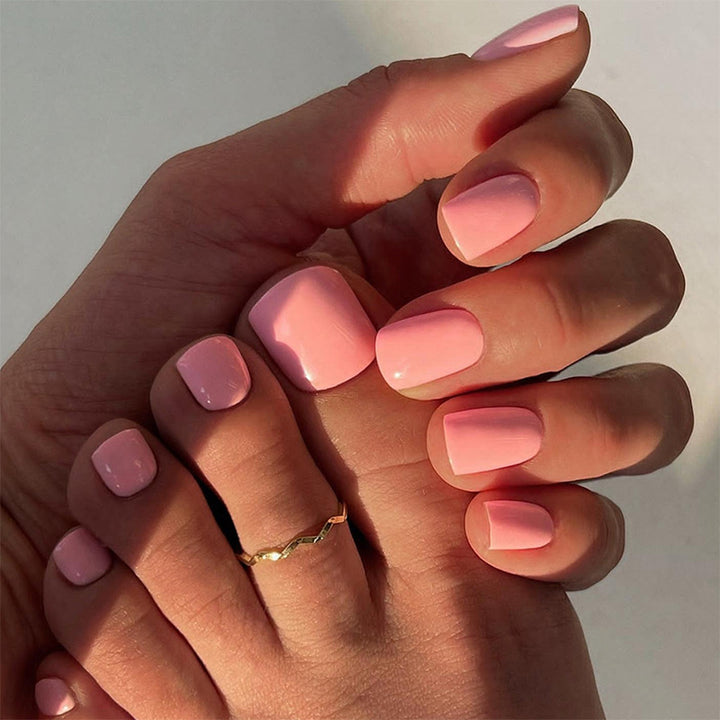Artificial nail set with elegant French tip design and modern accents Bowlift