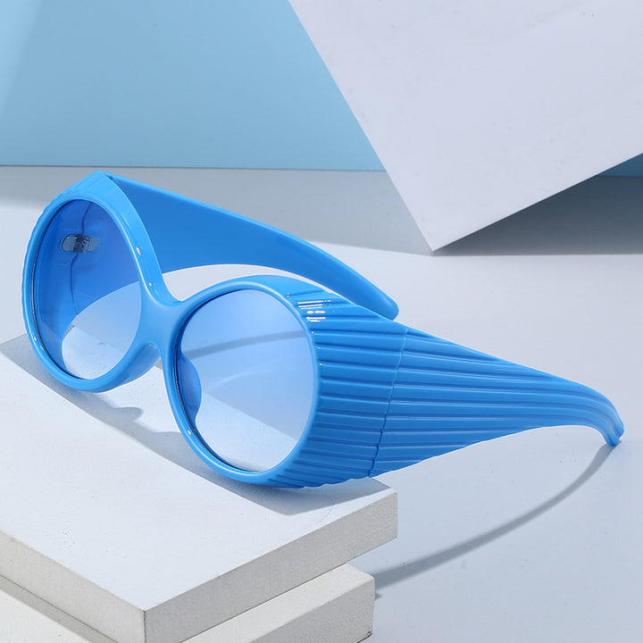 Women's extravagant sunglasses with unique wave design Bowlift
