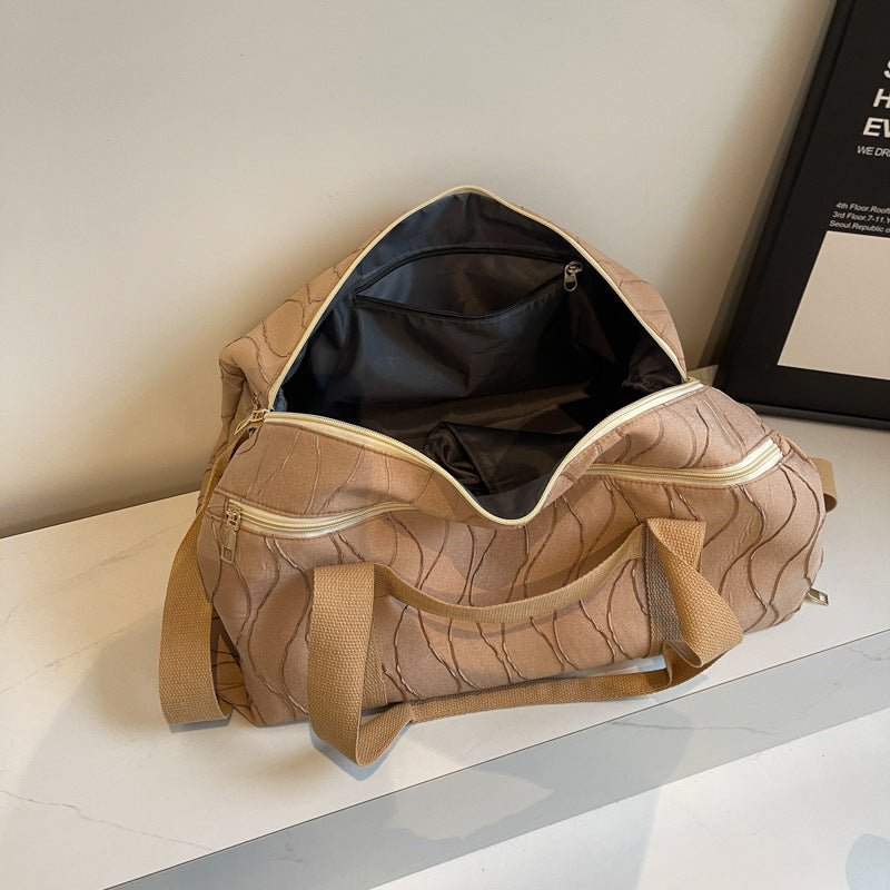 Sporty travel bag with stylish wave pattern Bowlift