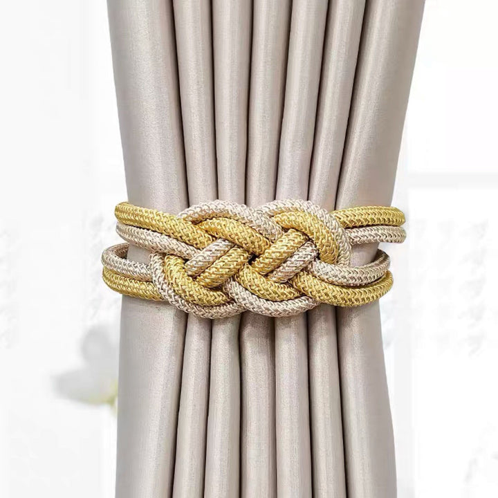 Decorative curtain tieback with braided design Bowlift