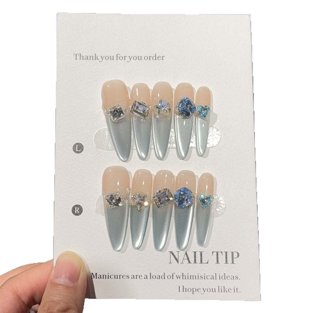 Glamorous artificial nails with sparkling stones Bowlift