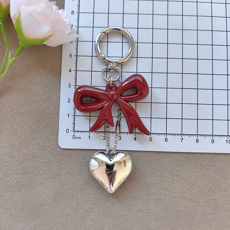 Keychain with bow and heart motif Bowlift