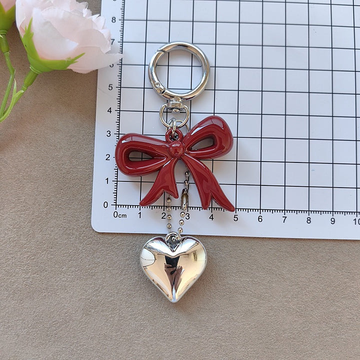 Keychain with bow and heart motif Bowlift