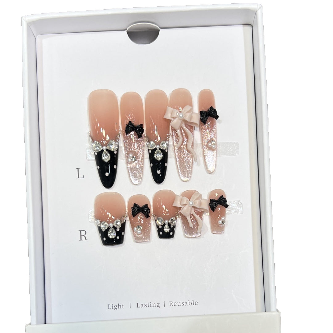 Glamorous Stiletto Press-On Nail Set with Decorative Bow and Gemstone Accents Bowlift