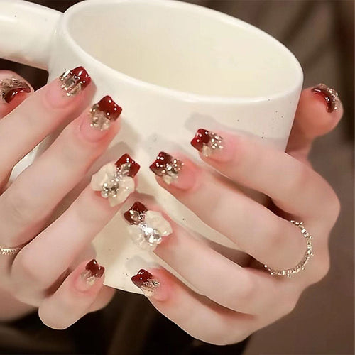 Artificial nails with glamorous floral decorations Bowlift