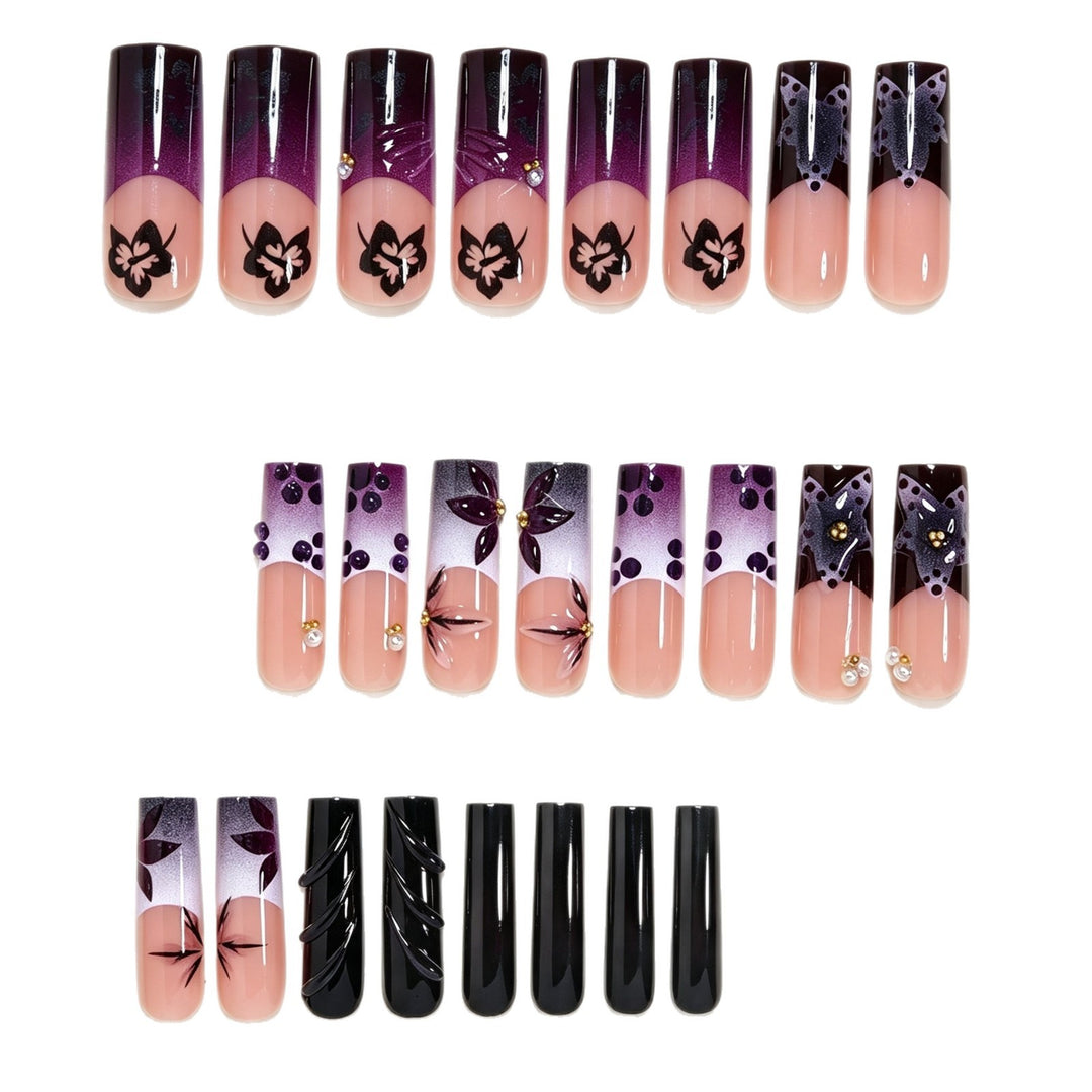 Artistic Long Nail Design with Floral Accents Bowlift
