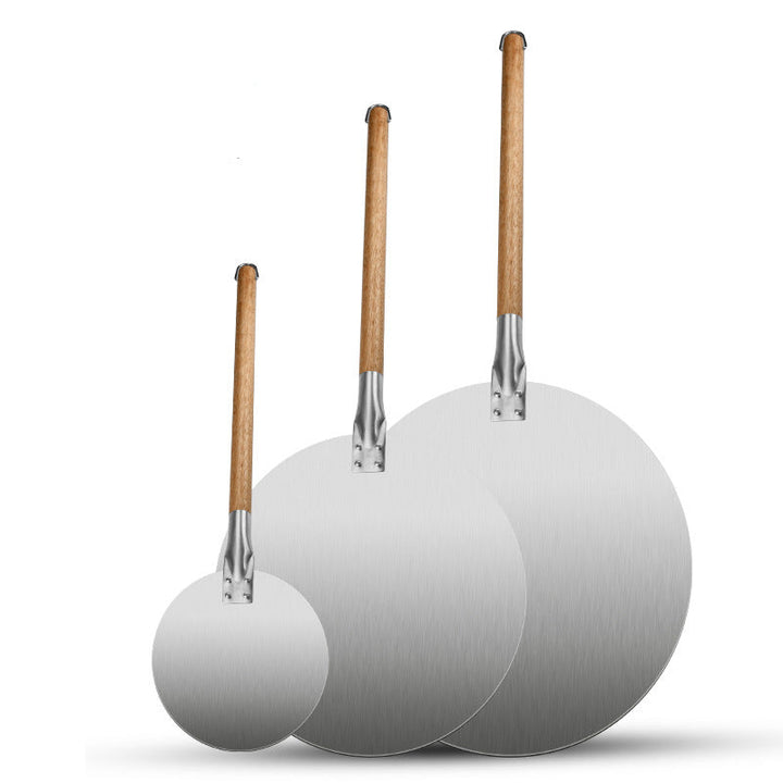 assorted sized round stainless steel pizza peels with long wooden handles Bowlift