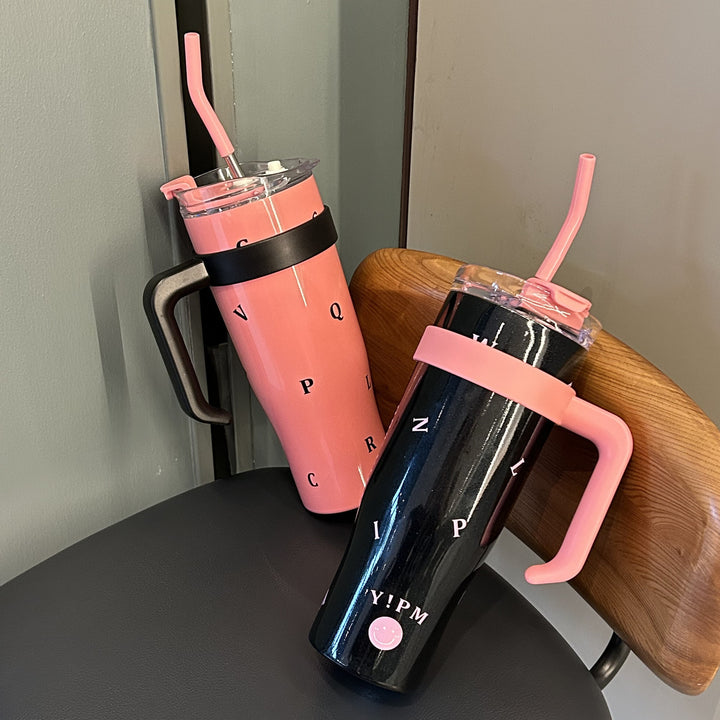 Women's insulated drinking bottle with integrated straw and ergonomic handle Bowlift