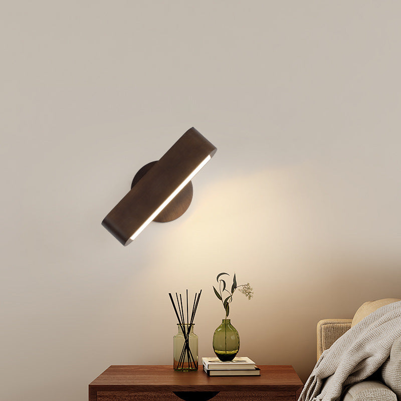 Compact bedside solid wood LED wall sconce with curved aluminum shade and frosted diffuser Bowlift