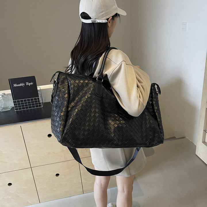 Handcrafted Travel Bag Made of Woven Leather Bowlift