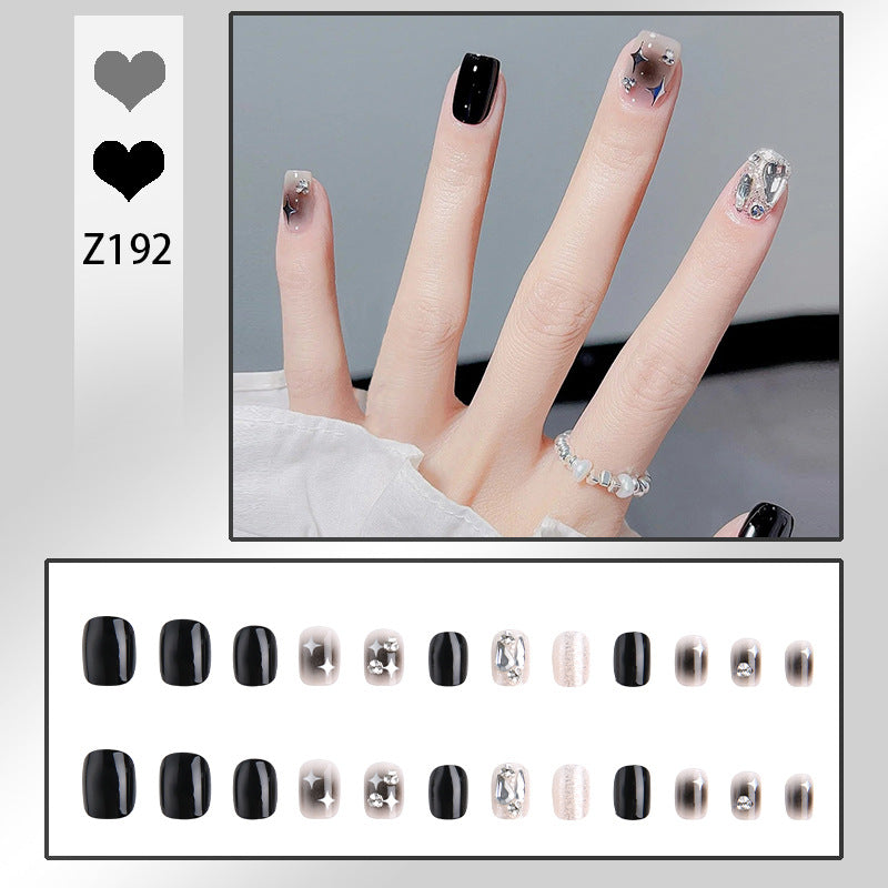 Artificial nail set with glamorous glitter and crystal decorations Bowlift