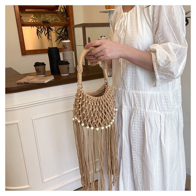 Hand-knotted shoulder bag with tassels Bowlift