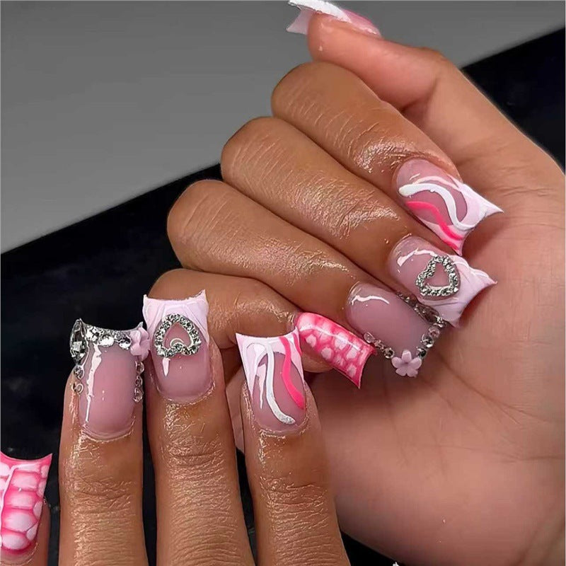 Decorative Press-On Nail Design with Heart and Gem Accents Bowlift
