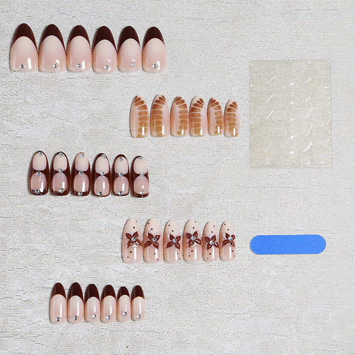 Artificial nails with elegant motif designs Bowlift