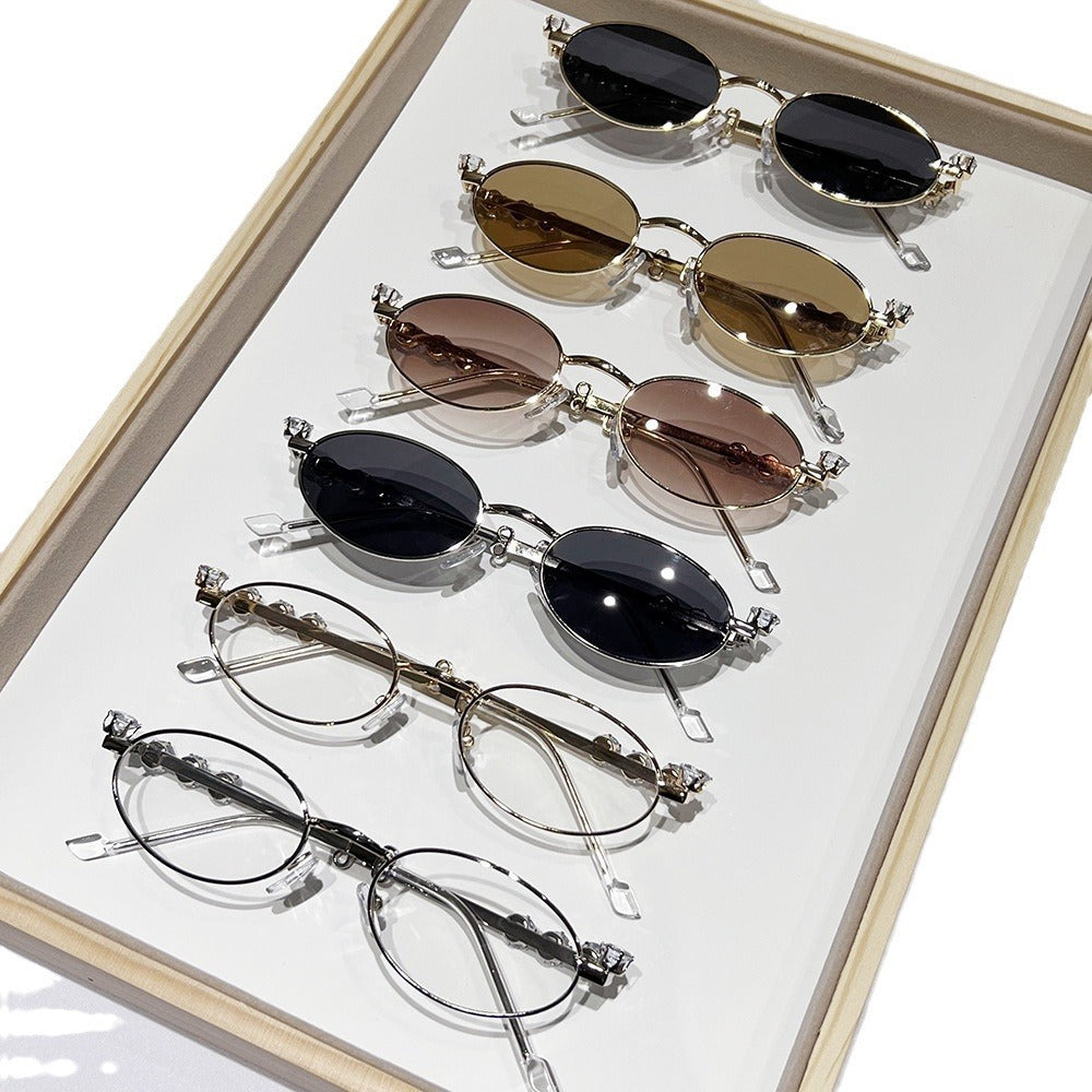 Fashion-Forward Oval Sunglasses with Crystal Accents Bowlift