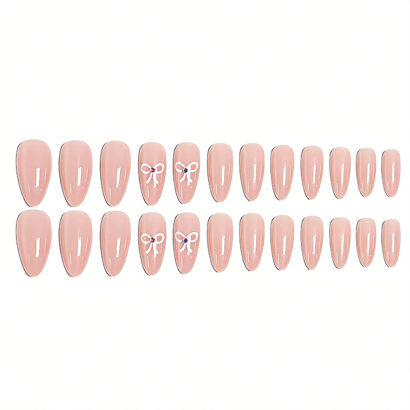 Artificia nails with delicate bow accents Bowlift