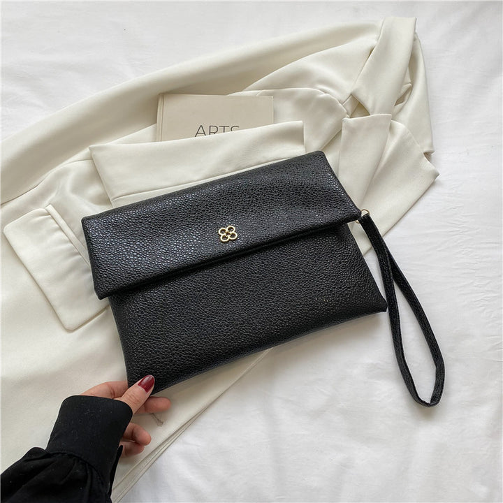 Elegant Textured Wristlet Clutch Bowlift