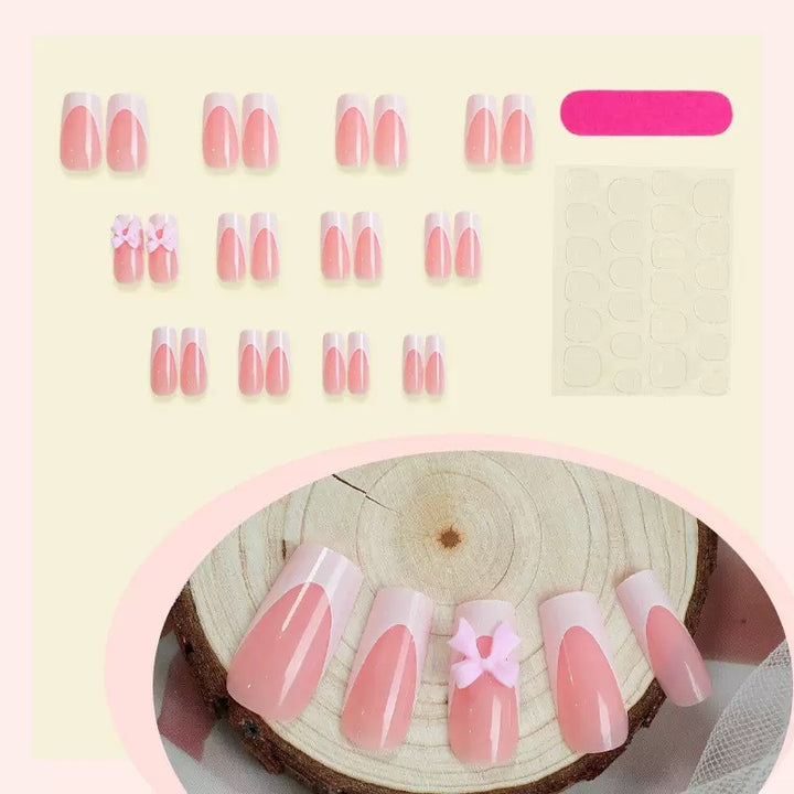 Nail set with playful bow design Bowlift