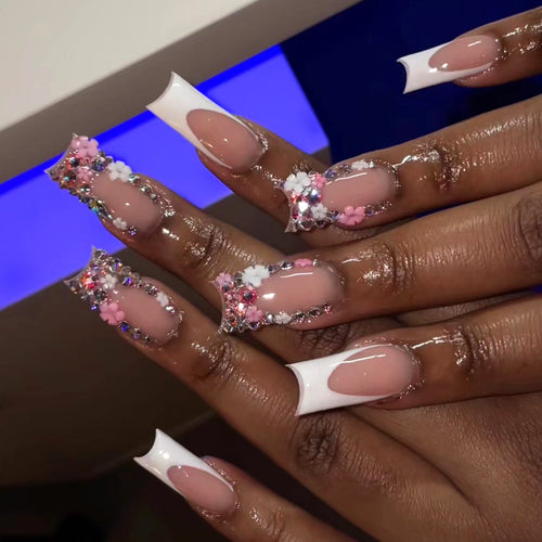 Artificial nails with floral decorations and glitter effects Bowlift