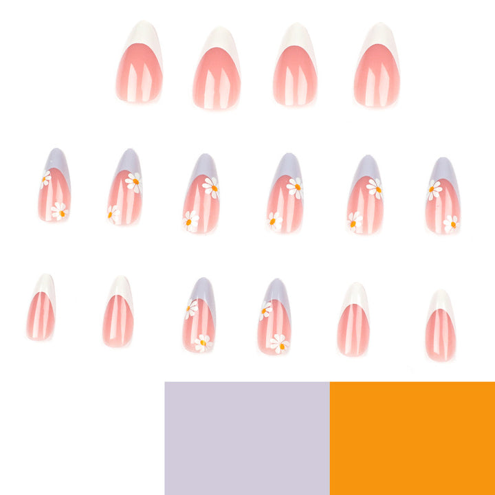 Elegant artificial nail design with delicate flower and ombre effects Bowlift