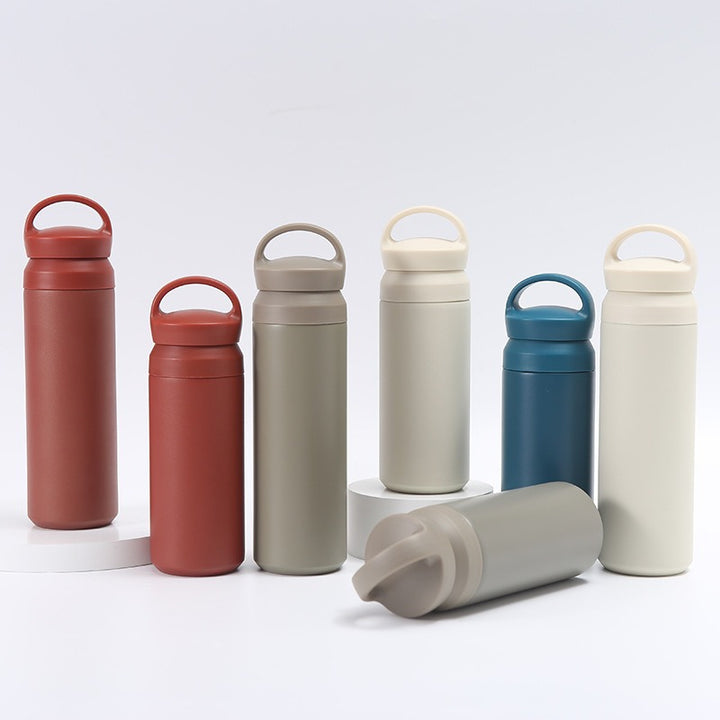 Women's premium insulated drinking bottle with ergonomic grip Bowlift