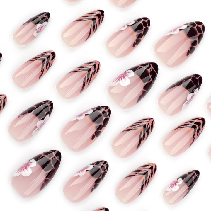 Artful Stiletto nails with floral accent Bowlift
