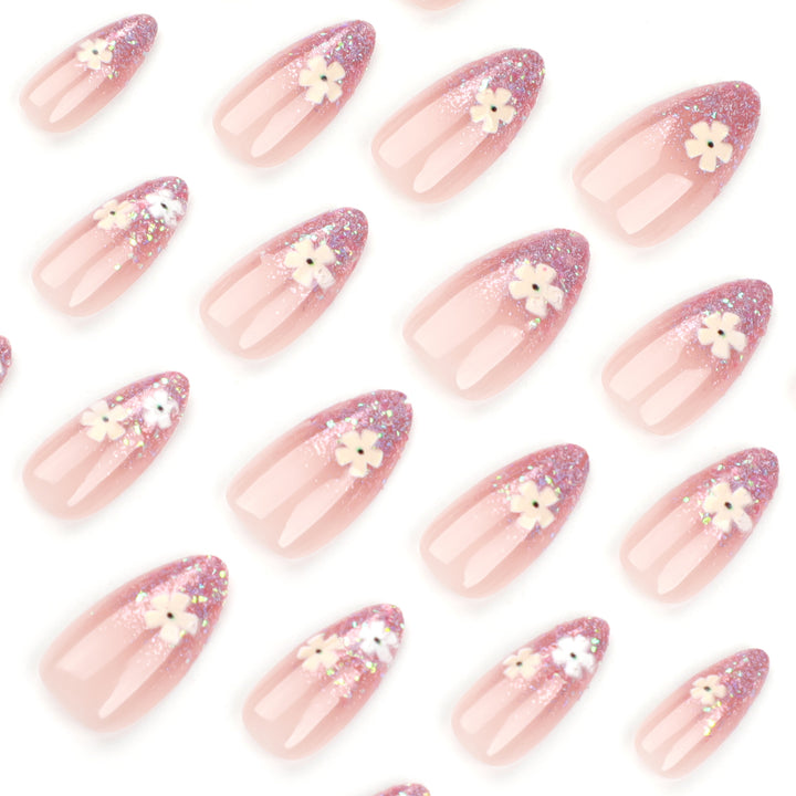 Glamorous nail extensions with glittering and floral design Bowlift