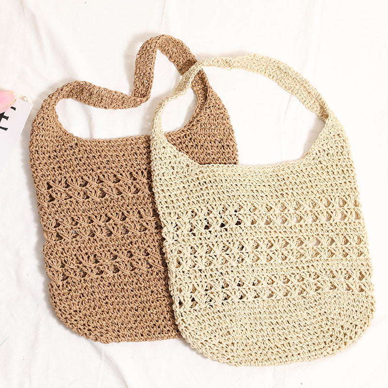 Crocheted shoulder bag with decorative hole pattern Bowlift